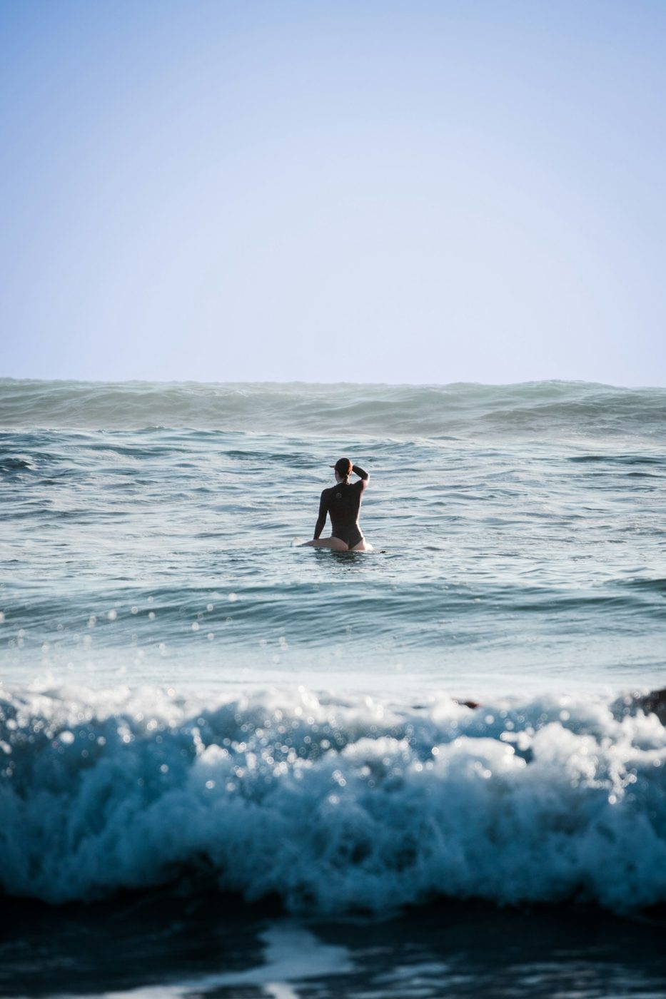 Regional photograph — a surfer in the lineup at Cerritos Beach, Baja California Sur, Mexico.