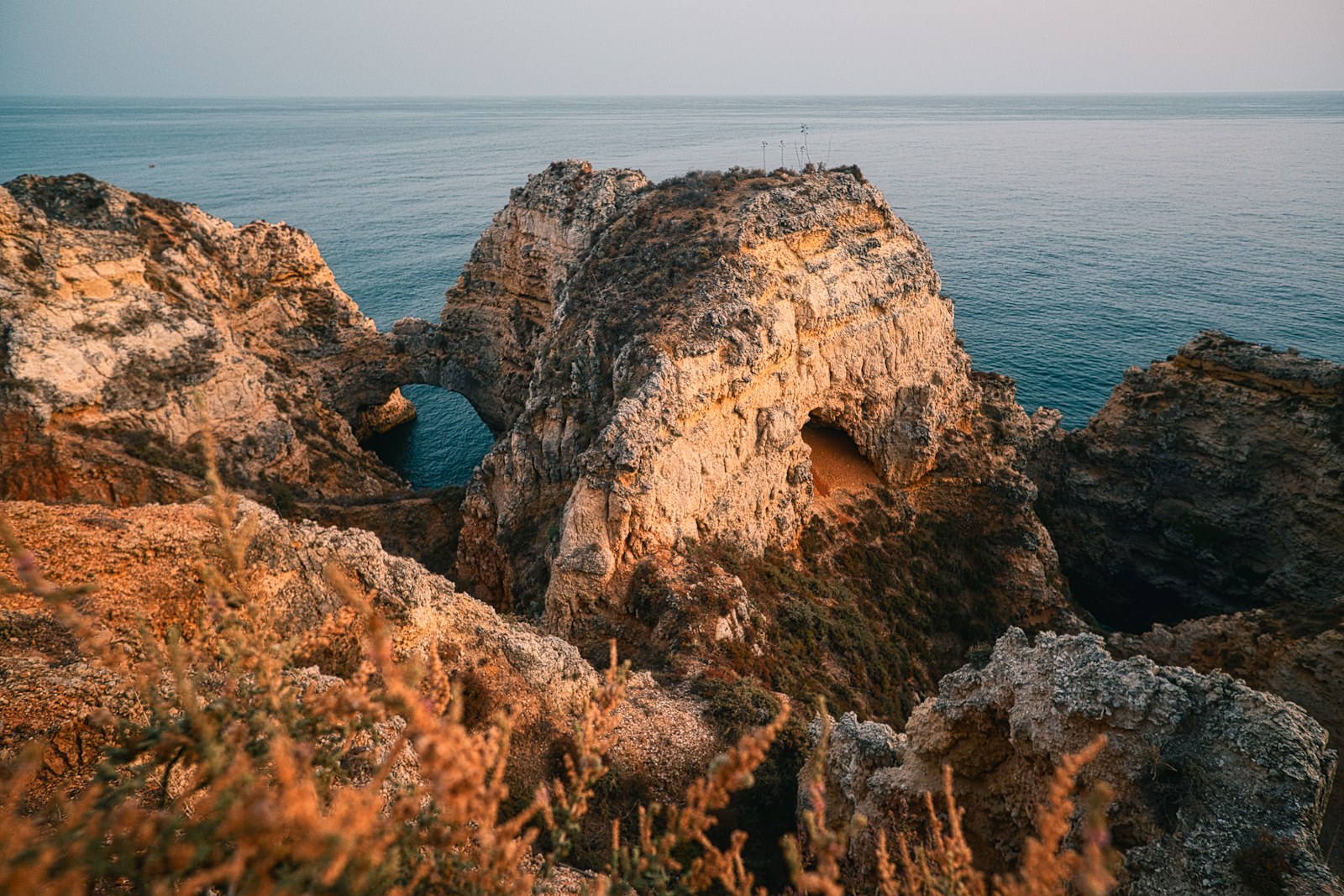 Atlantic surf breaking beside the rocky Algarve coast